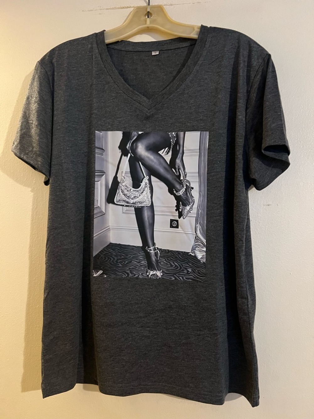 Grey T-Shirt w/vinyl print.